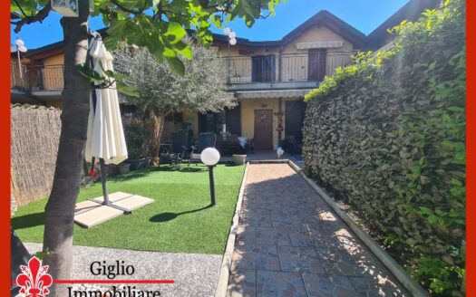 Trilocale al piano terra con giardino e taverna